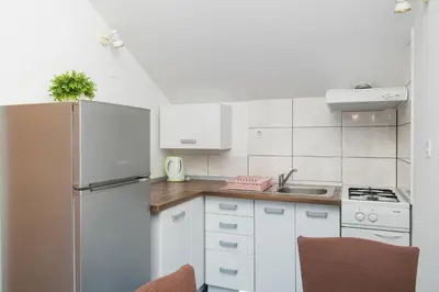 Kuhinja ili čajna kuhinja u objektu Apartment Den