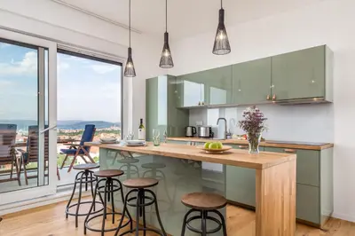 Kuhinja ili čajna kuhinja u objektu Penthouse SeaByMe with 2 Terraces