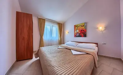 Krevet ili kreveti u jedinici u objektu Apartments by the sea Rogoznica - 17458