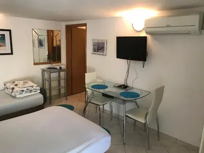 TV i/ili zabavni centar u objektu Apartment house Berry