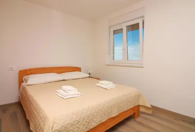 Krevet ili kreveti u jedinici u objektu Apartmani Nejašmić