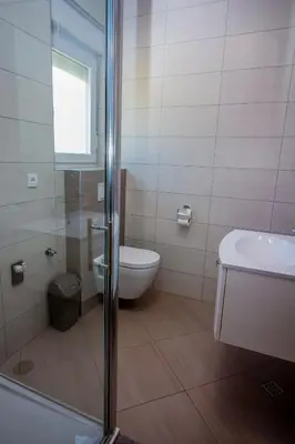Kupaonica u objektu Apartmani Nejašmić