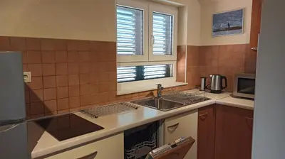 Kuhinja ili čajna kuhinja u objektu Seaside Apartments Laurus Murter