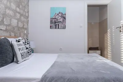 Krevet ili kreveti u jedinici u objektu Bounty Apartments