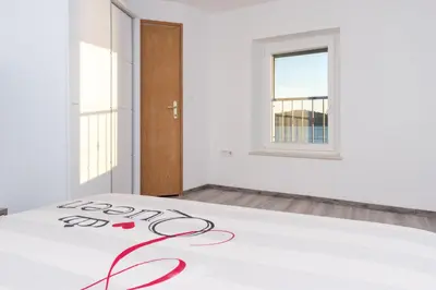 Krevet ili kreveti u jedinici u objektu Bounty Apartments