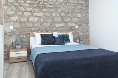 Krevet ili kreveti u jedinici u objektu Bounty Apartments