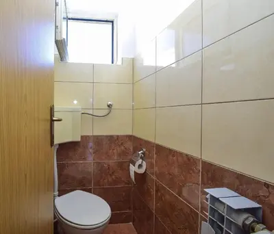 Kupaonica u objektu Apartments Snjeza