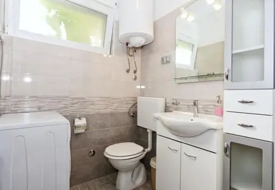 Kupaonica u objektu Apartments Snjeza