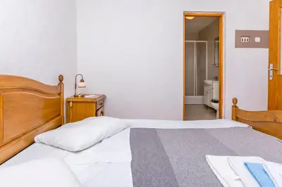 Krevet ili kreveti u jedinici u objektu Apartments IvaT