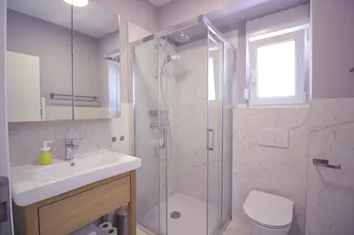 Kupaonica u objektu Sun Apartments