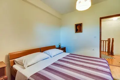 Krevet ili kreveti u jedinici u objektu Apartments Land