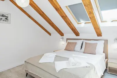 Krevet ili kreveti u jedinici u objektu Apartmani Bruna