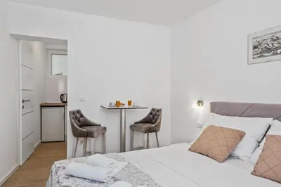 Krevet ili kreveti u jedinici u objektu Apartmani Bruna