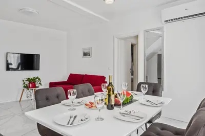 TV i/ili zabavni centar u objektu Apartmani Bruna