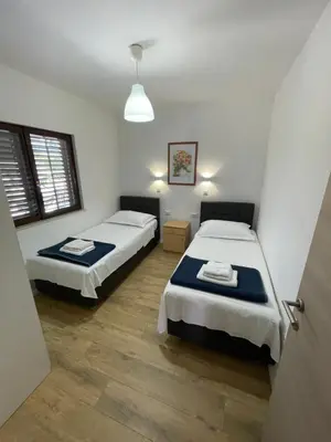 Krevet ili kreveti u jedinici u objektu Apartmani Soldic-Ražanj