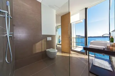 Kupaonica u objektu Golden Rays Luxury Villas & Apartments