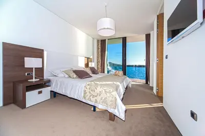 Krevet ili kreveti u jedinici u objektu Golden Rays Luxury Villas & Apartments