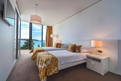 Krevet ili kreveti u jedinici u objektu Golden Rays Luxury Villas & Apartments