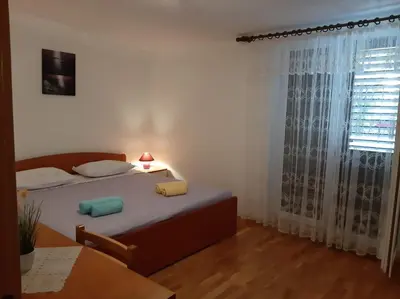 Krevet ili kreveti u jedinici u objektu Apartmani Marija