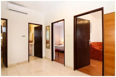 Krevet ili kreveti u jedinici u objektu Apartmani Bruno