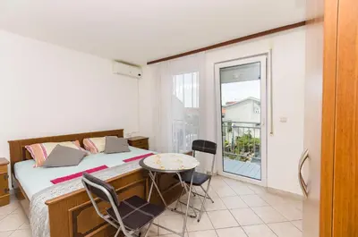 Krevet ili kreveti u jedinici u objektu Apartment and Room Ilija