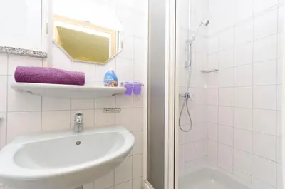 Kupaonica u objektu Apartment and Room Ilija