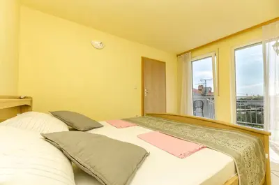 Krevet ili kreveti u jedinici u objektu Apartment and Room Ilija