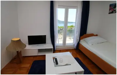 Krevet ili kreveti u jedinici u objektu Apartmani Slavka