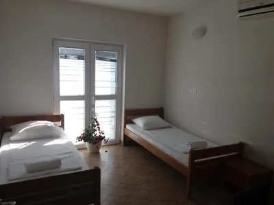 Krevet ili kreveti u jedinici u objektu 4 Bedroom Apartment in Tisno (8+4)