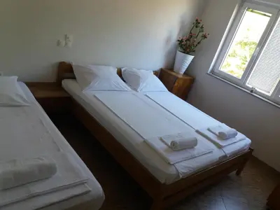 Krevet ili kreveti u jedinici u objektu 4 Bedroom Apartment in Tisno (8+4)