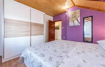 Krevet ili kreveti u jedinici u objektu 3 Bedroom Gorgeous Apartment In Skradin