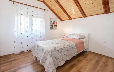 Krevet ili kreveti u jedinici u objektu 3 Bedroom Gorgeous Apartment In Skradin