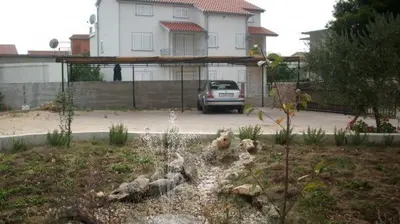 Vrt u objektu Apartment in Pirovac with Terrace, Air conditioning, Wi-Fi, Washing machine (4793-3)