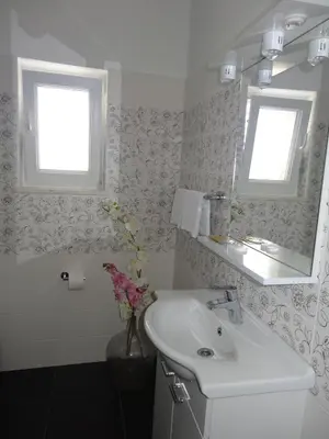 Kupaonica u objektu Gina Bed & Breakfast