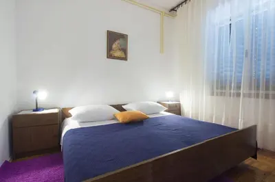 Krevet ili kreveti u jedinici u objektu Apartments Vinko