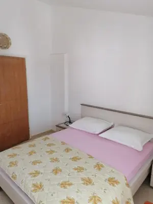 Krevet ili kreveti u jedinici u objektu Apartments Vinko
