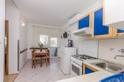 Kuhinja ili čajna kuhinja u objektu Apartments Melita