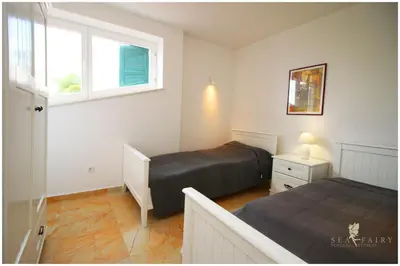 Krevet ili kreveti u jedinici u objektu SeaView Apartment - Rogoznica