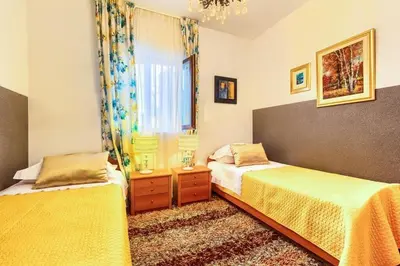 Krevet ili kreveti u jedinici u objektu Apartments Lidija