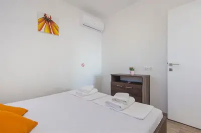 Krevet ili kreveti u jedinici u objektu Villa Top of Murter, two bedroom apartment
