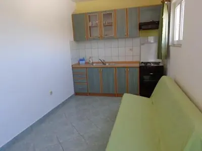 Kuhinja ili čajna kuhinja u objektu Apartment in Grebaštica with sea view, terrace, WiFi (3571-5)