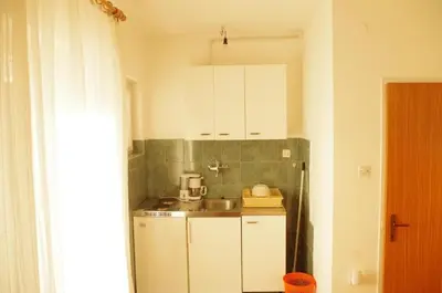 Kuhinja ili čajna kuhinja u objektu Apartment in Tisno with sea view, balcony, air conditioning, WiFi (4874-2)