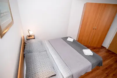Krevet ili kreveti u jedinici u objektu Apartmani 