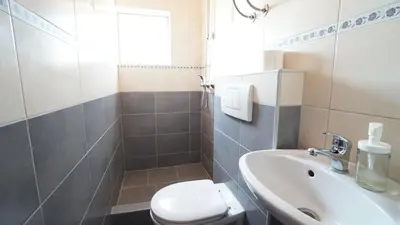 Kupaonica u objektu Guest House Sandra