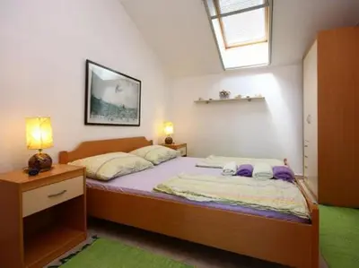 Krevet ili kreveti u jedinici u objektu Family friendly seaside apartments Krapanj, Sibenik - 18004
