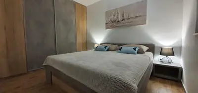 Krevet ili kreveti u jedinici u objektu Apartmani Tisno TM