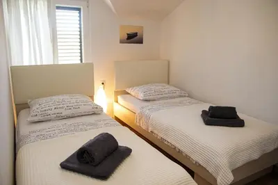 Krevet ili kreveti u jedinici u objektu Kaprije apartmani Tina i Ena