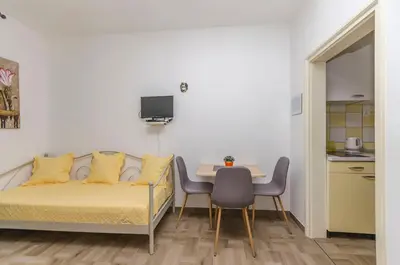 TV i/ili zabavni centar u objektu Apartment Robyn on the beach