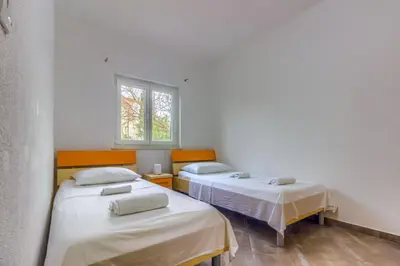 Krevet ili kreveti u jedinici u objektu Apartment in Pirovac with terrace, air conditioning, WiFi (4925-3)