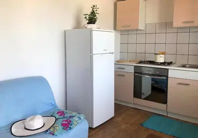 Kuhinja ili čajna kuhinja u objektu Apartment Denis